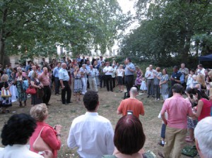 Dr Dan speaking to guests at the summer BBQ